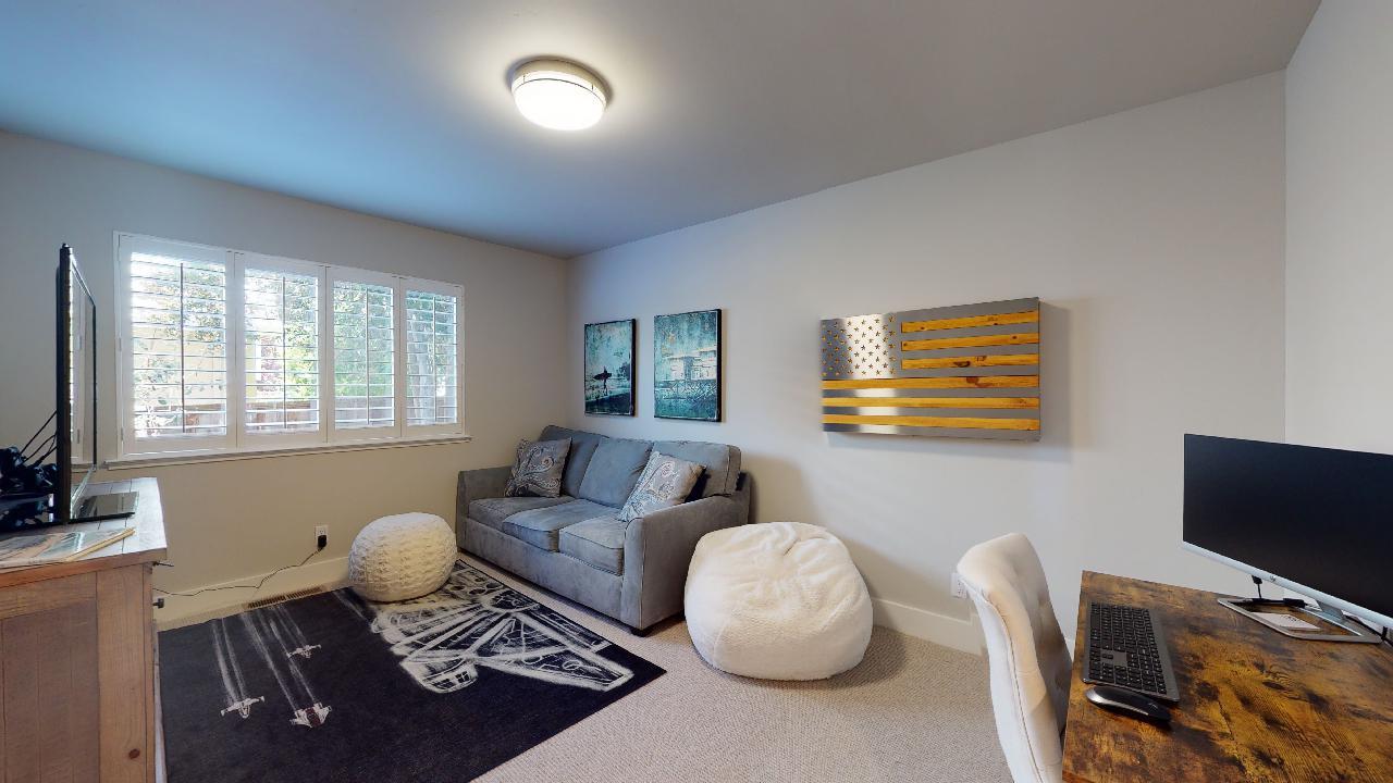 150 Vía Soderini Aptos, CA 95003 - Photo 31 of 73 a living room with furniture and a flat screen tv