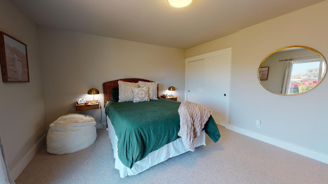 150 Vía Soderini Aptos, CA 95003 - Photo 34 of 73 a bedroom with a bed and a mirror