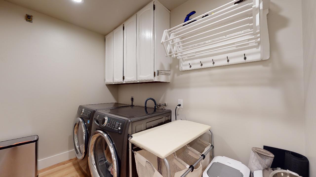 150 Vía Soderini Aptos, CA 95003 - Photo 42 of 73 a utility room with stainless steel appliances washer and dryer