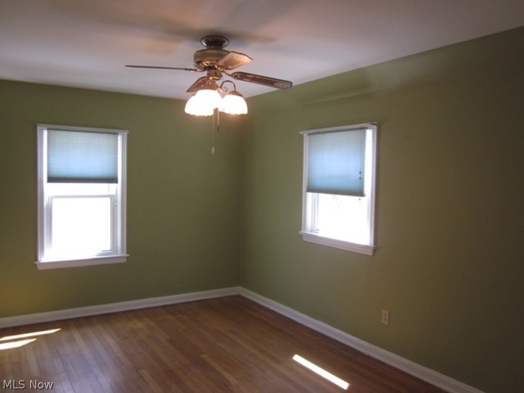2390 Queenston Road Cleveland, OH 44118 - Photo 12 of 17 Bedroom with ceiling fan and hardwood floors.