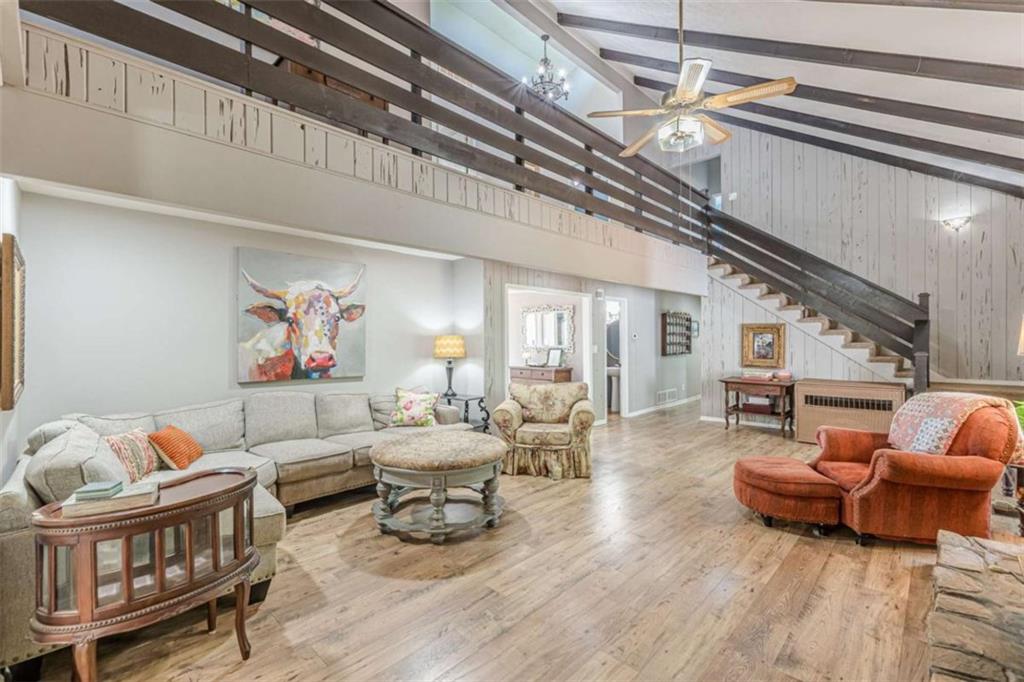2229 South Van Wert Road Villa Rica, GA 30180 - Photo 17 of 92 a living room with furniture and a wooden floor