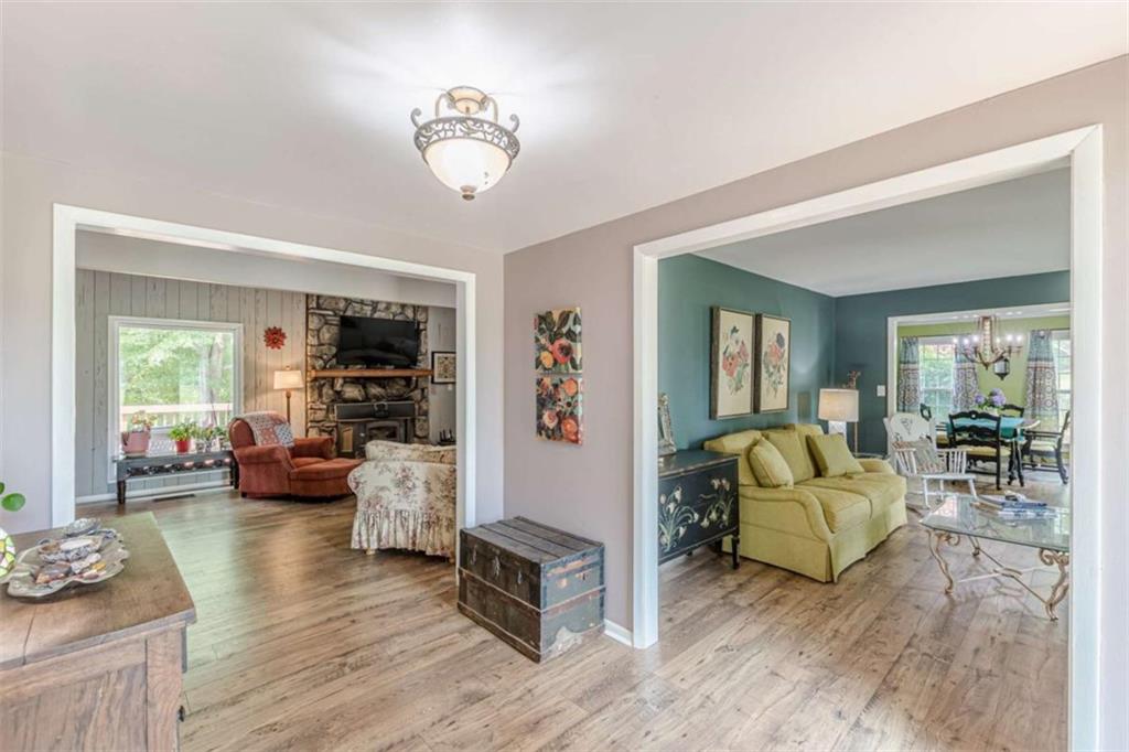 2229 South Van Wert Road Villa Rica, GA 30180 - Photo 3 of 92 a living room with furniture and a wooden floor