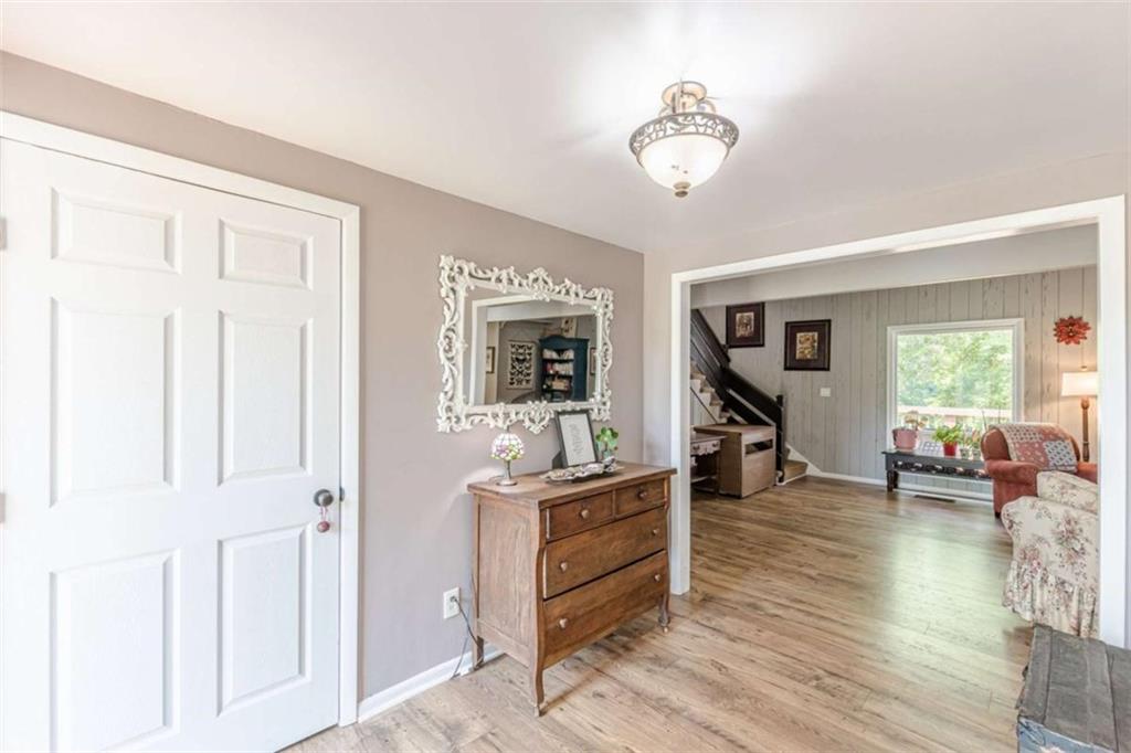 2229 South Van Wert Road Villa Rica, GA 30180 - Photo 4 of 92 a view of a livingroom with furniture window and wooden floor