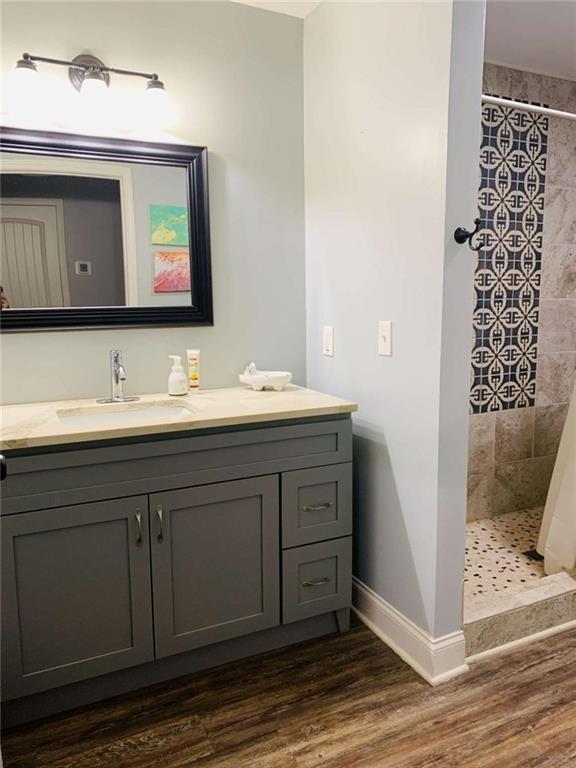 2229 South Van Wert Road Villa Rica, GA 30180 - Photo 53 of 92 a bathroom with a sink and a mirror