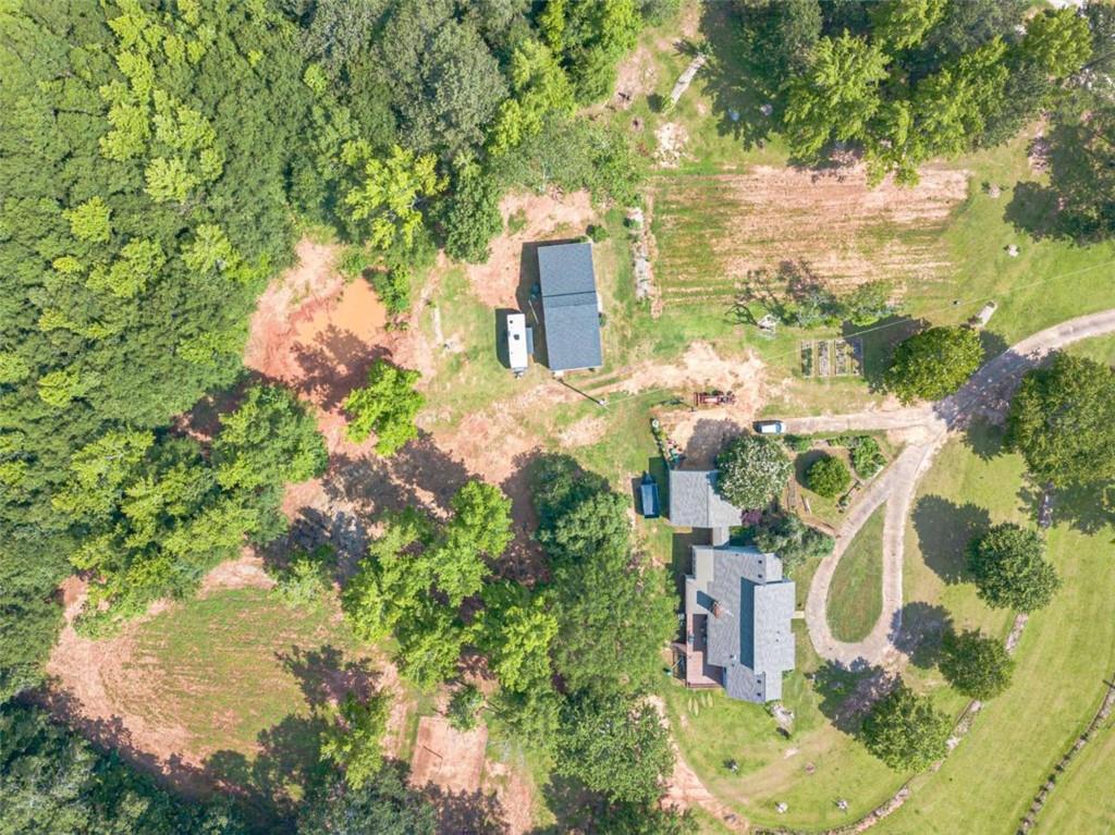 2229 South Van Wert Road Villa Rica, GA 30180 - Photo 85 of 92 an aerial view of residential house with outdoor space and trees all around