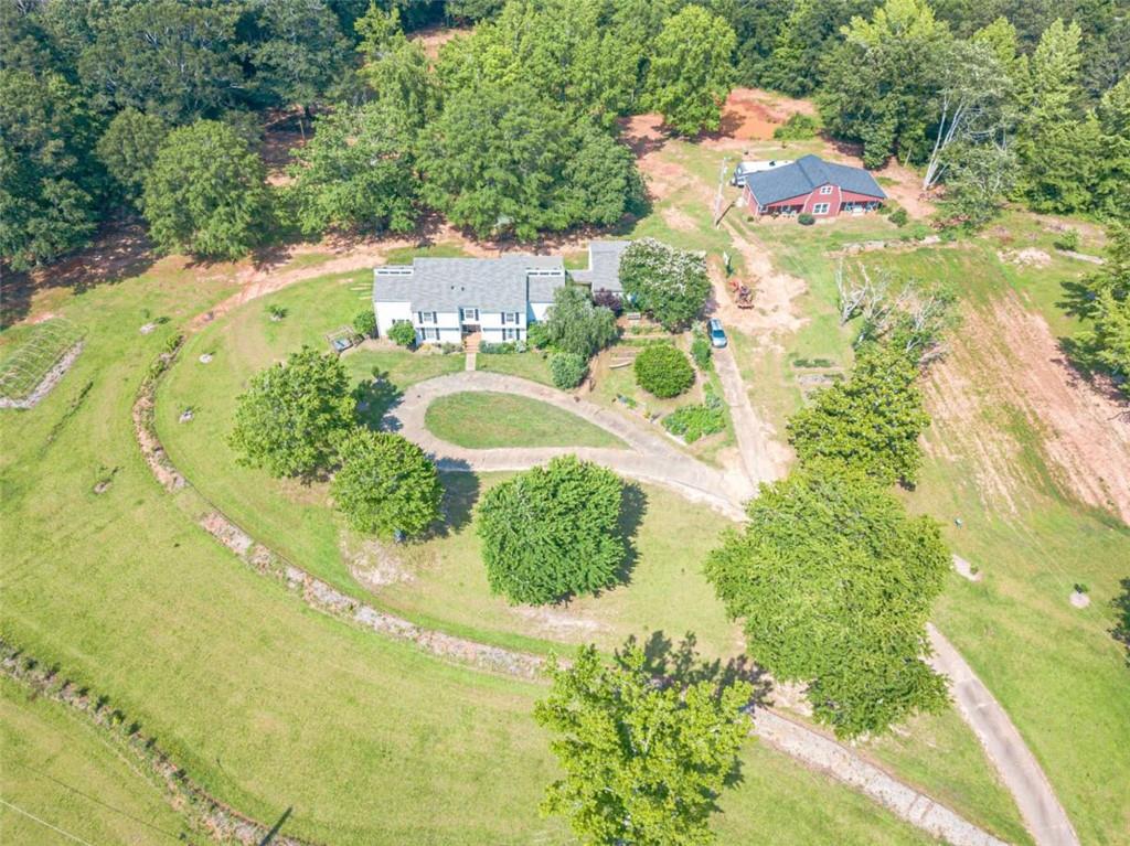 2229 South Van Wert Road Villa Rica, GA 30180 - Photo 89 of 92 a aerial view of a house with a yard and plants