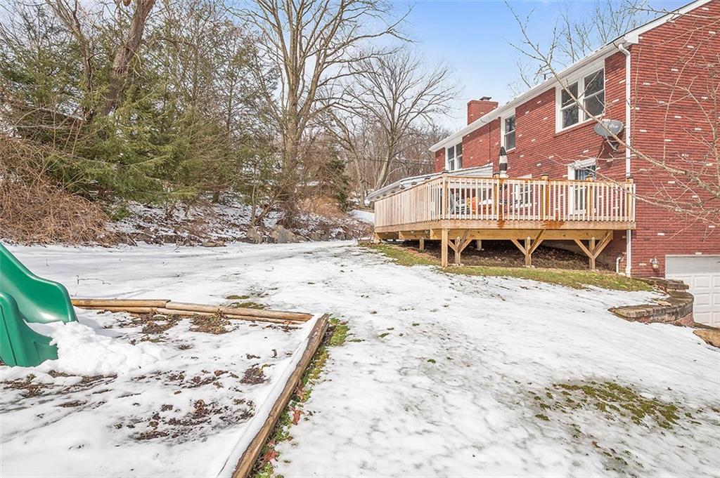 227 Elm Road Pittsburgh, PA 15239 - Photo 22 of 25 a view of a house with a yard