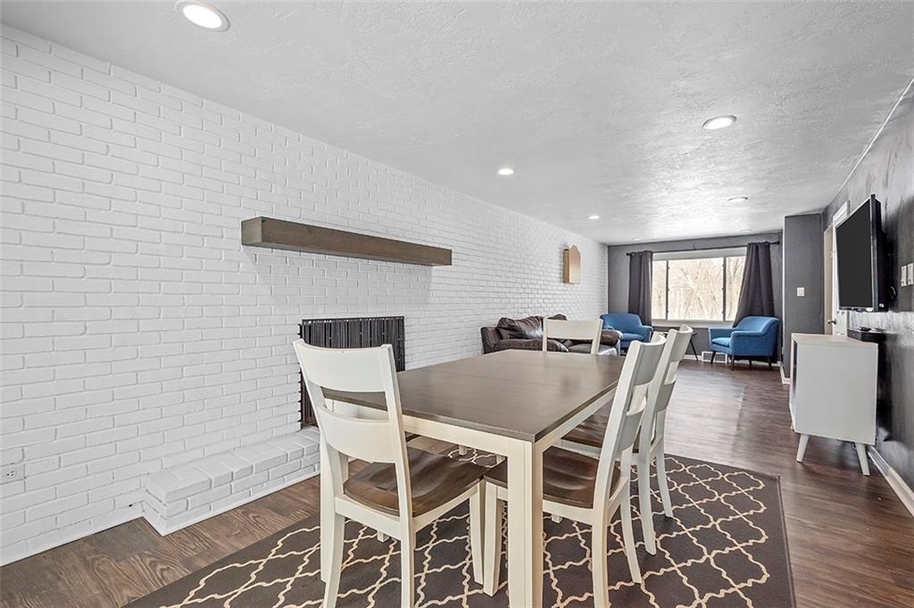227 Elm Road Pittsburgh, PA 15239 - Photo 8 of 25 a view of a dining room with furniture
