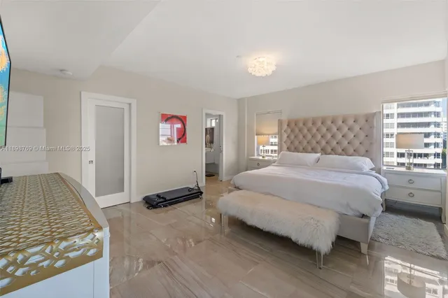 a bathroom with a shower and a sink