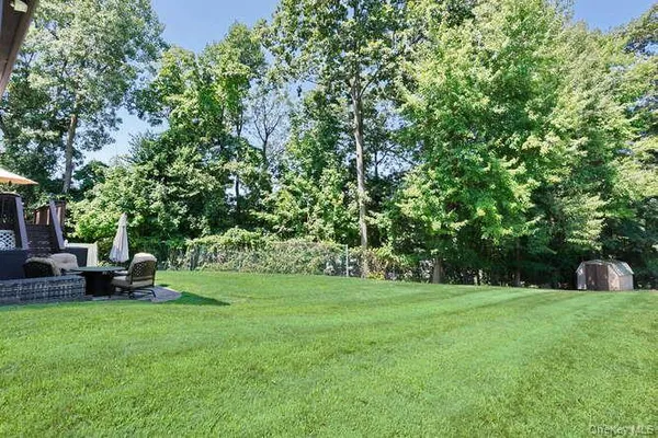a view of a garden with trees