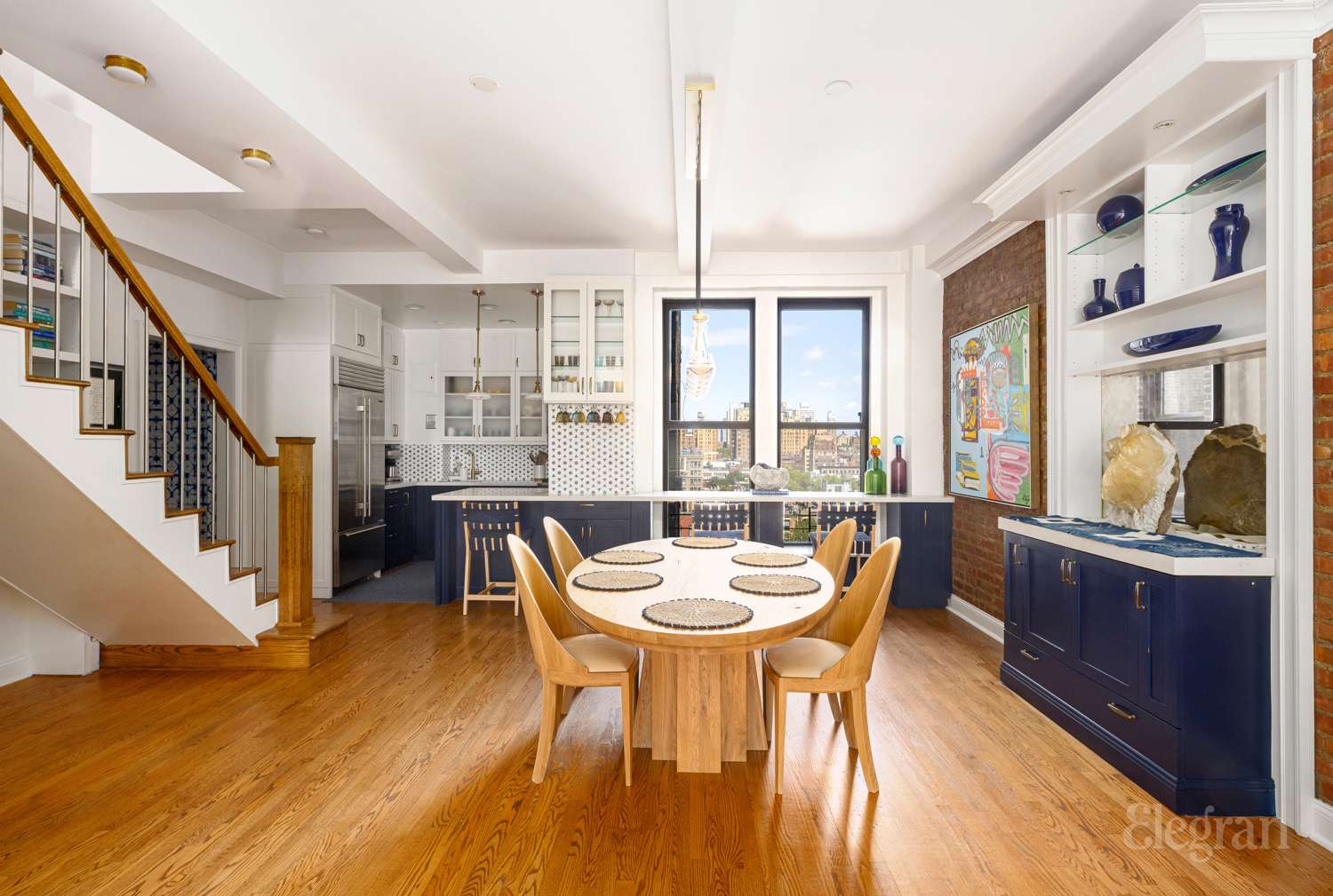135 West 79th Street, Unit 9A/10A Manhattan, NY 10024 - Photo 3 of 12 a dining room with furniture window and wooden floor