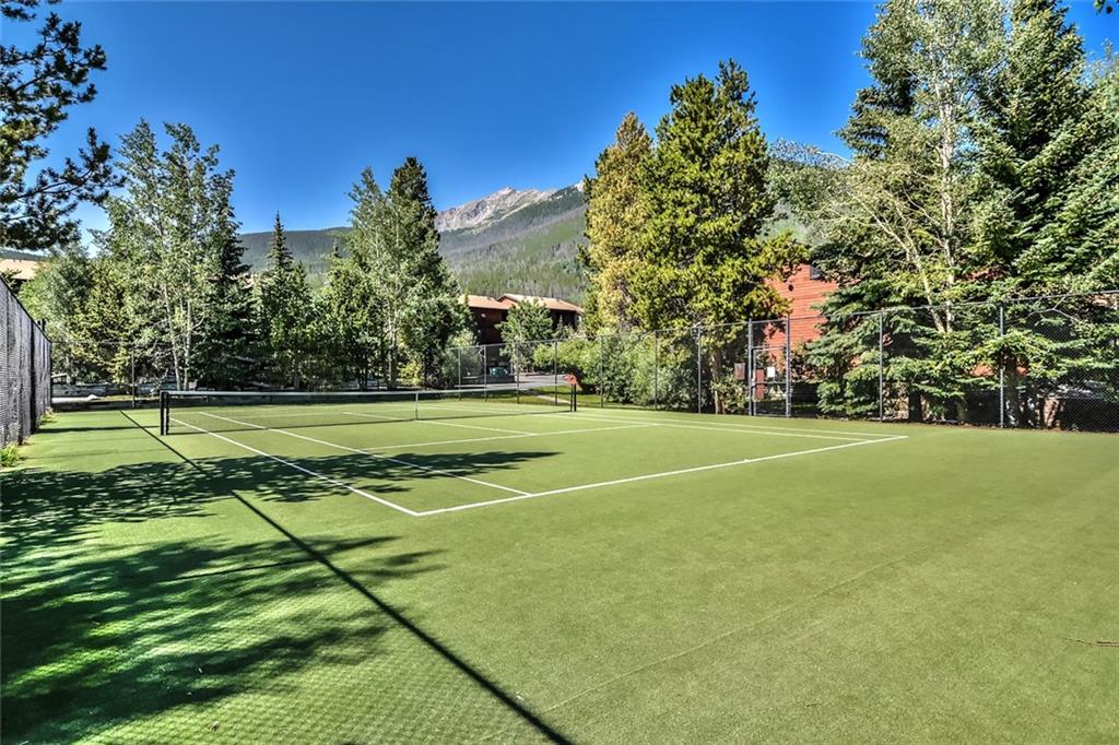 500 Bills Ranch Road, Unit 201C Frisco, CO 80443 - Photo 22 of 22 a view of a tennis ground with large trees