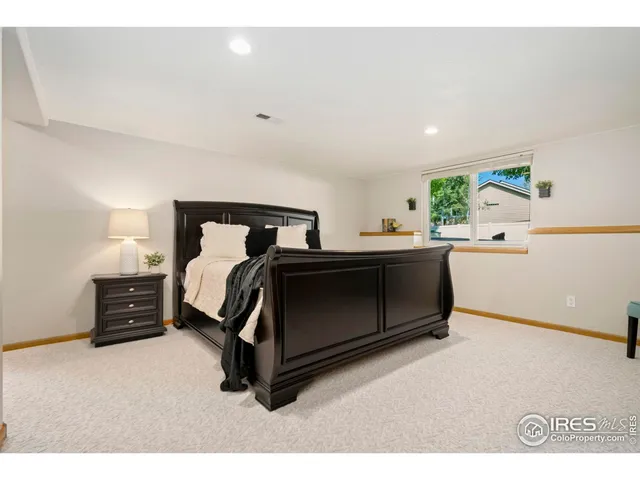 a bedroom with furniture and a bed