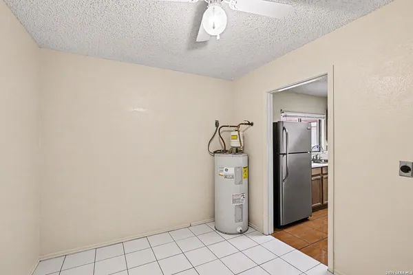 a view of a storage & utility room with closet