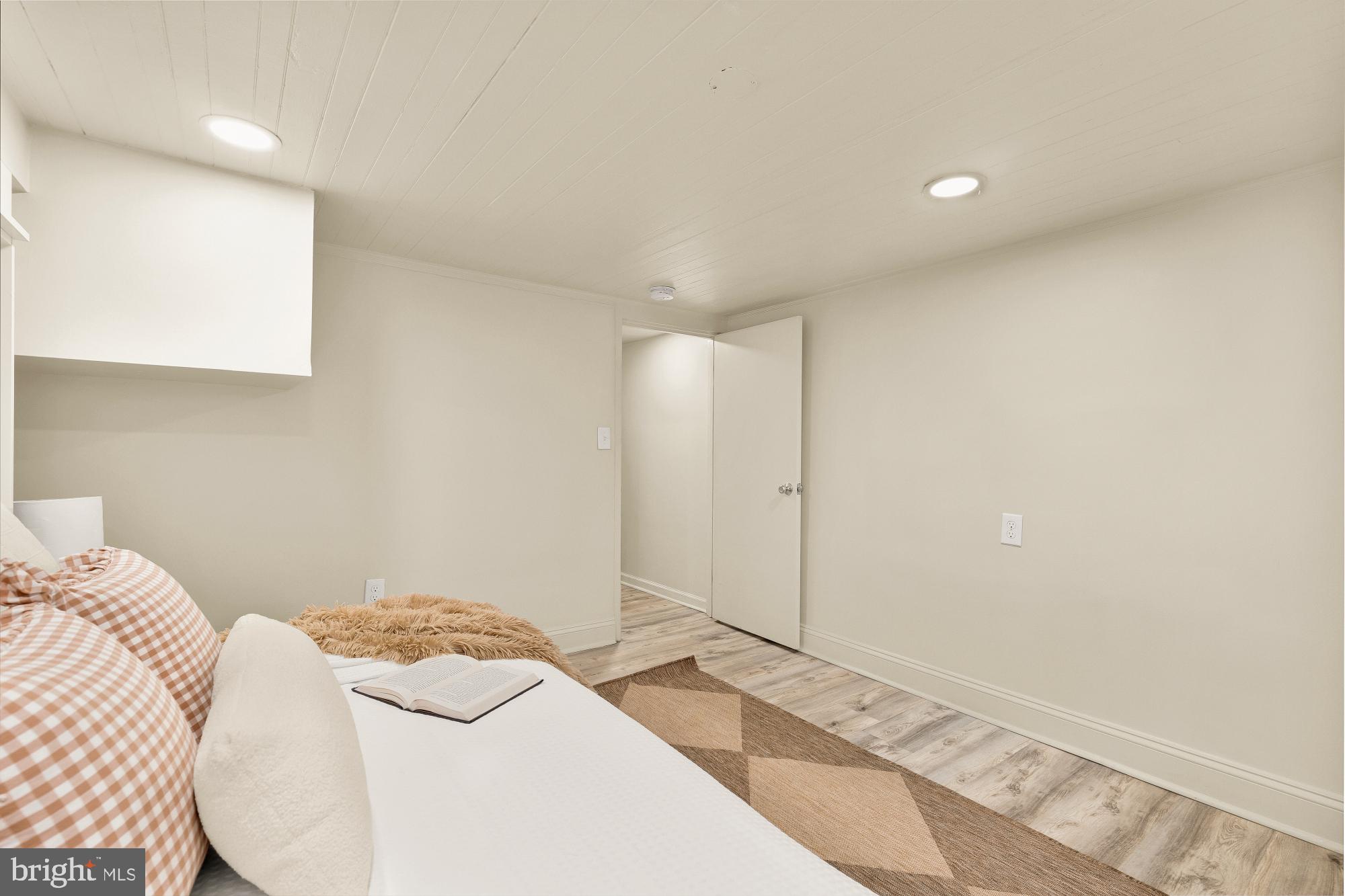 1452 Battery Avenue Baltimore, MD 21230 - Photo 23 of 27 close the Murphy bed for more space for activities