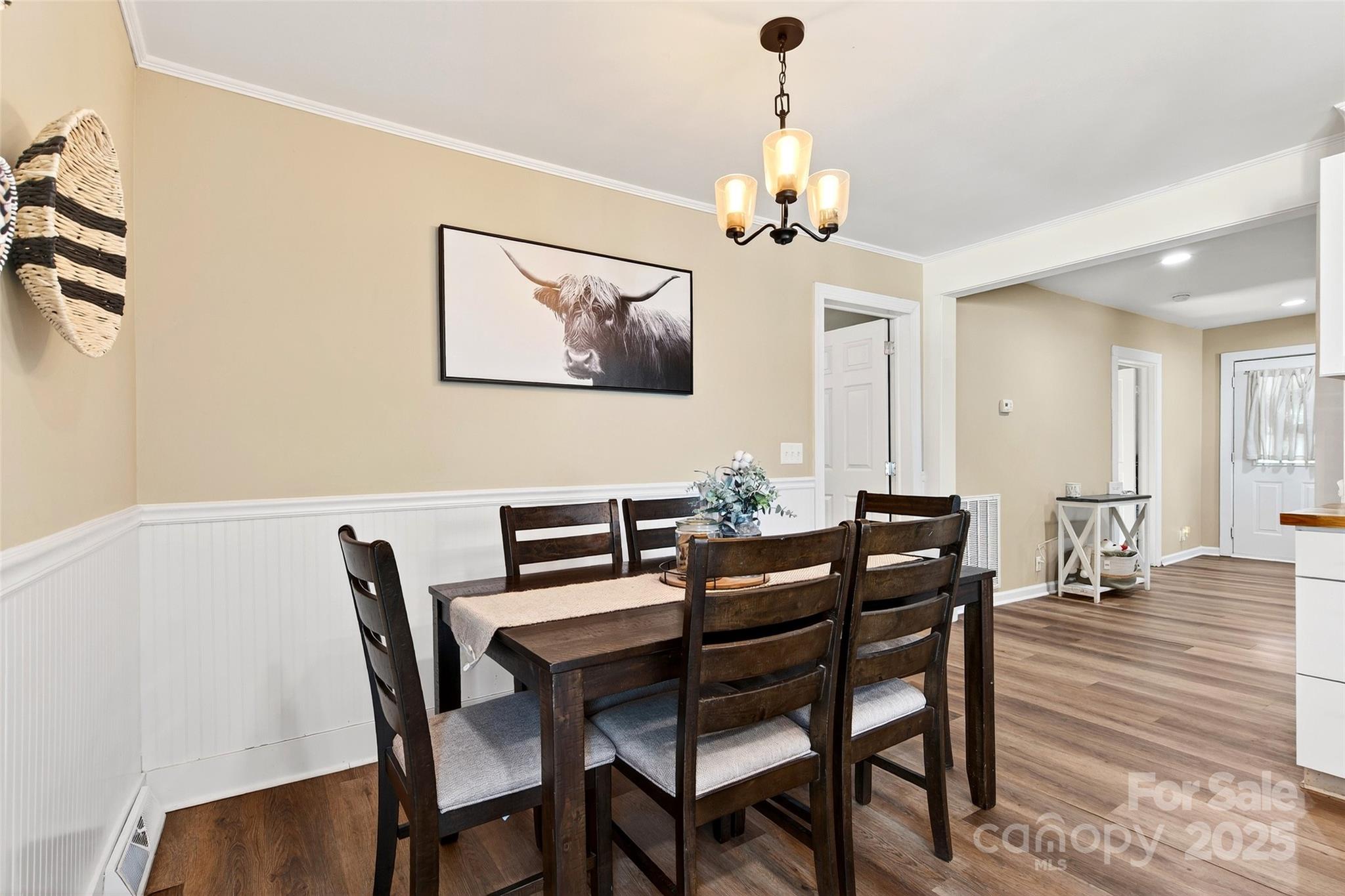 87 2nd Street Marion, NC 28752 - Photo 14 of 31 a view of a dining room with furniture and wooden floor