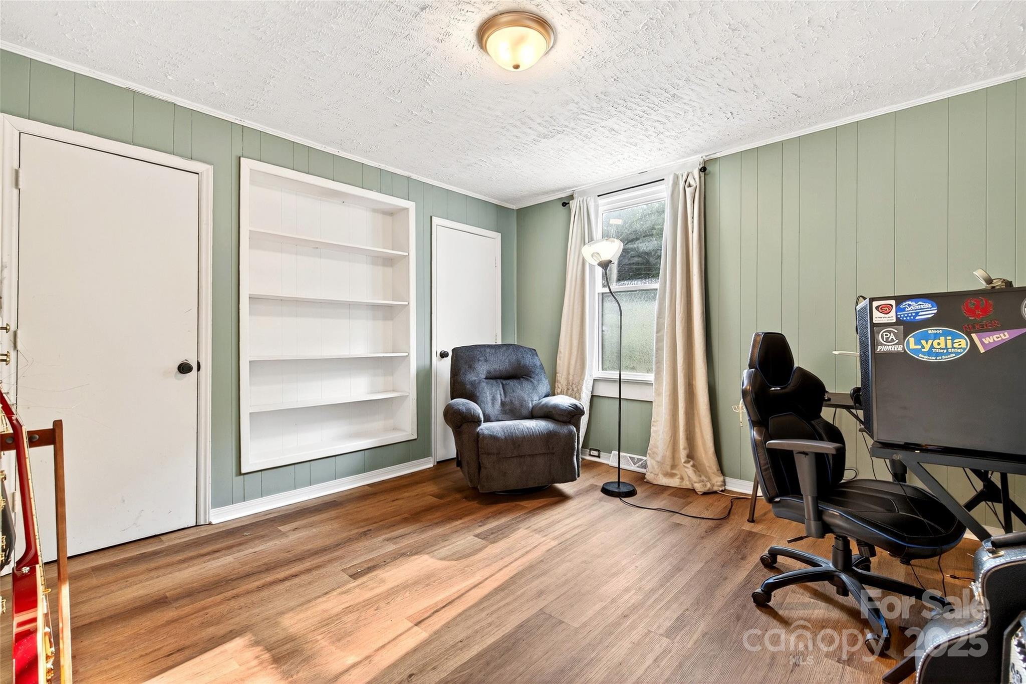 87 2nd Street Marion, NC 28752 - Photo 23 of 31 a view of workspace with wooden floor windows