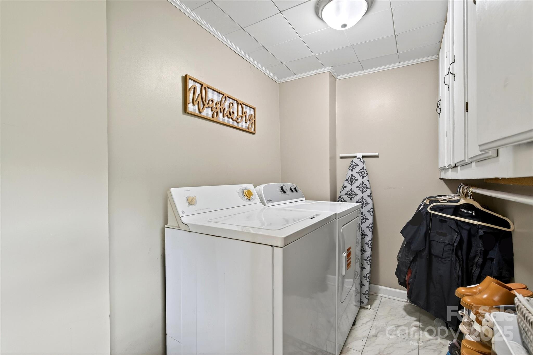 87 2nd Street Marion, NC 28752 - Photo 25 of 31 a utility room with dryer and washer