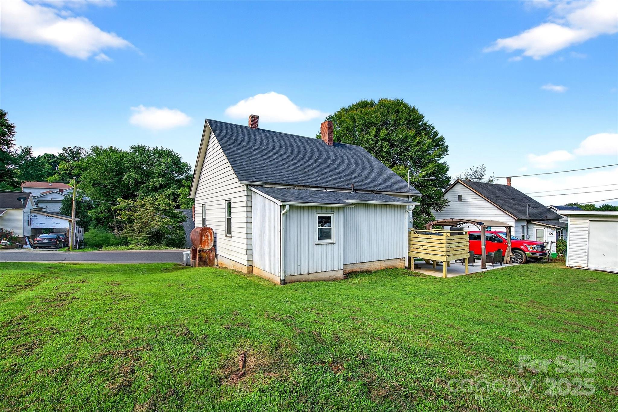 87 2nd Street Marion, NC 28752 - Photo 29 of 31 a view of a house with a yard and tree s