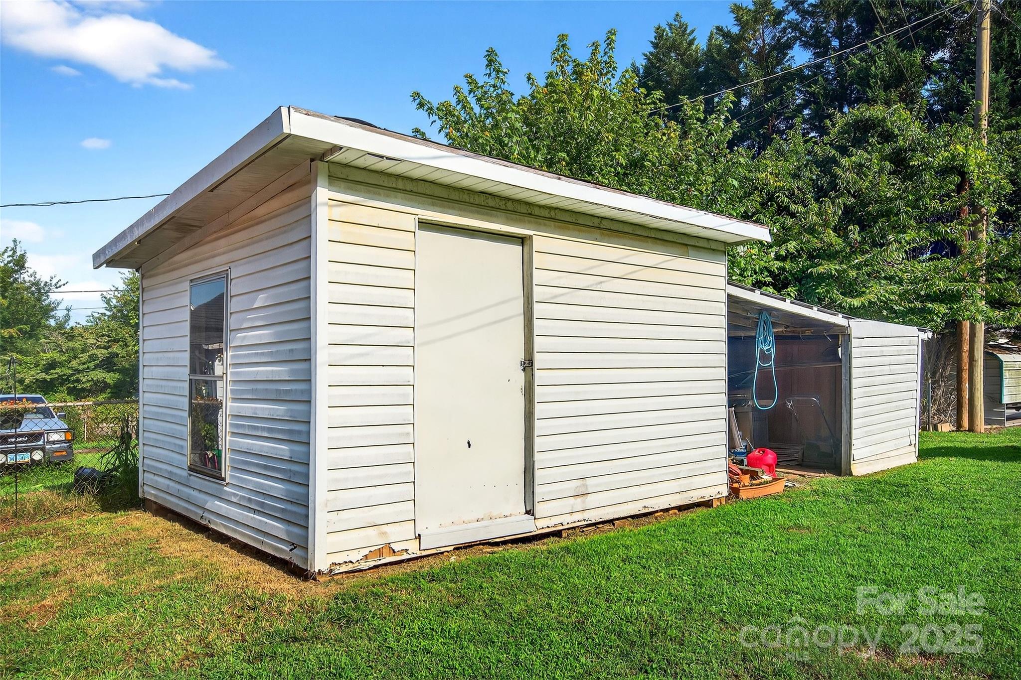87 2nd Street Marion, NC 28752 - Photo 31 of 31 a view of a house with a yard