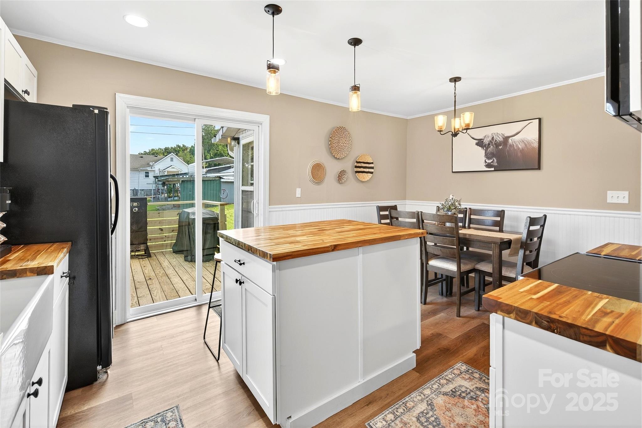 87 2nd Street Marion, NC 28752 - Photo 10 of 31 a kitchen that has a sink a stove and a refrigerator