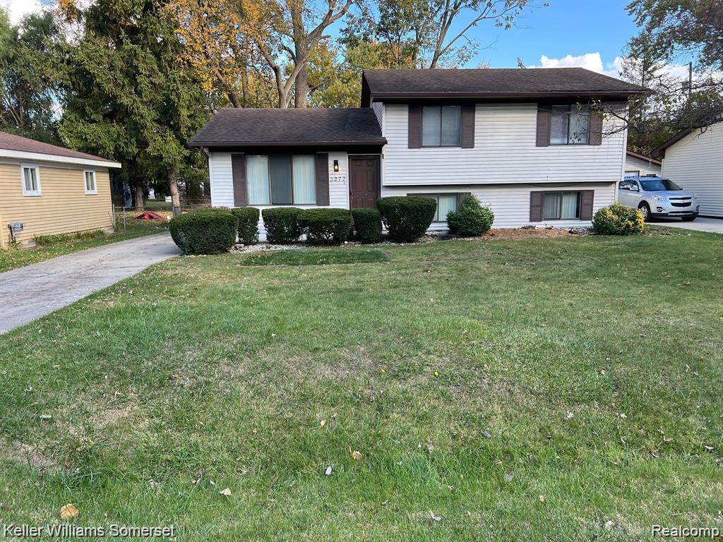 3277 Eastern Avenue Rochester, MI 48307 - Photo 1 of 13 Split-level residence featuring white siding and brown trim