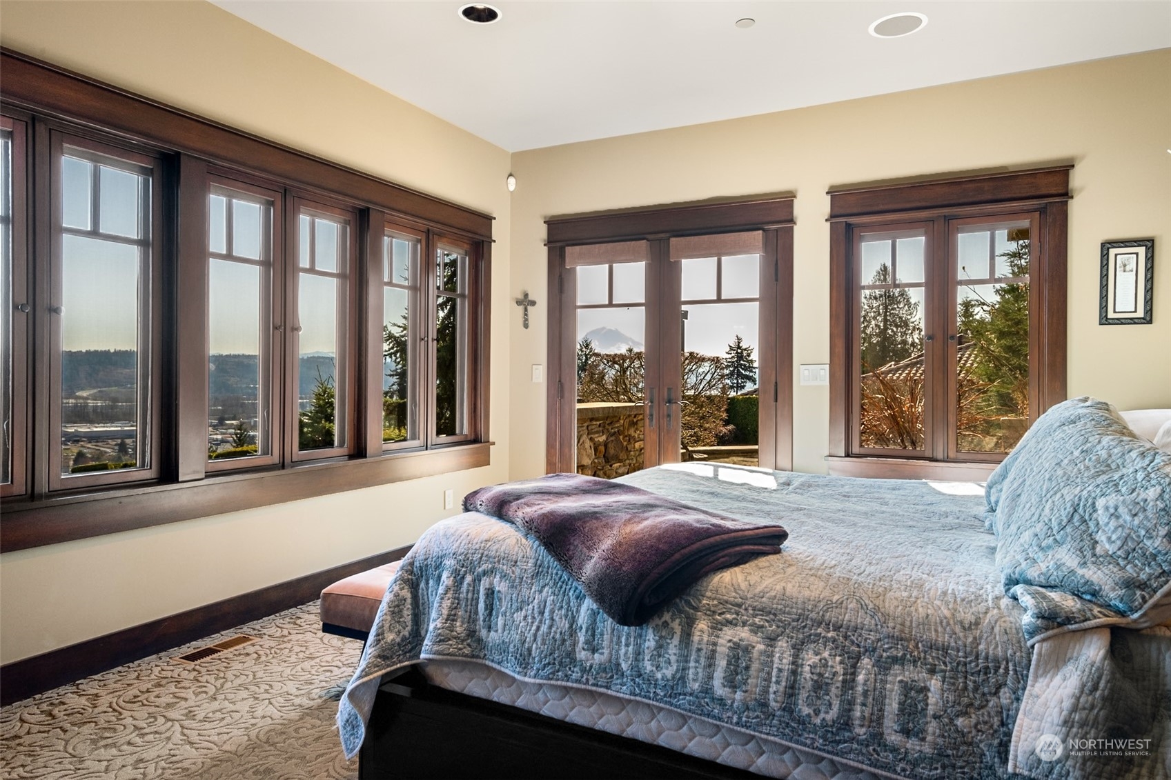 12408 County Line Road East Edgewood, WA 98372 - Photo 18 of 40 a bedroom with a large bed and a large window