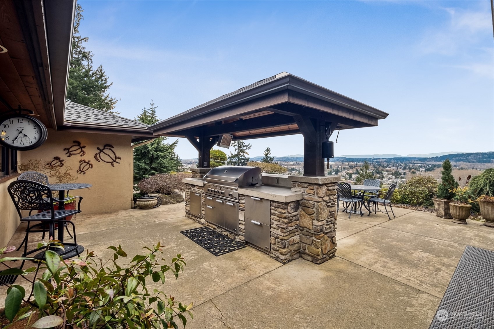 12408 County Line Road East Edgewood, WA 98372 - Photo 29 of 40 a view of a chairs and table in the patio