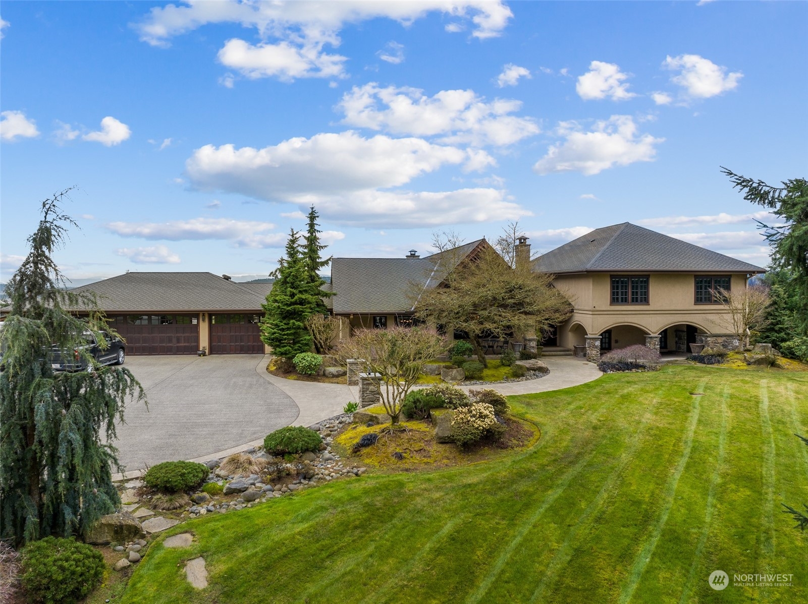 12408 County Line Road East Edgewood, WA 98372 - Photo 36 of 40 a view of a house with swimming pool and sitting area