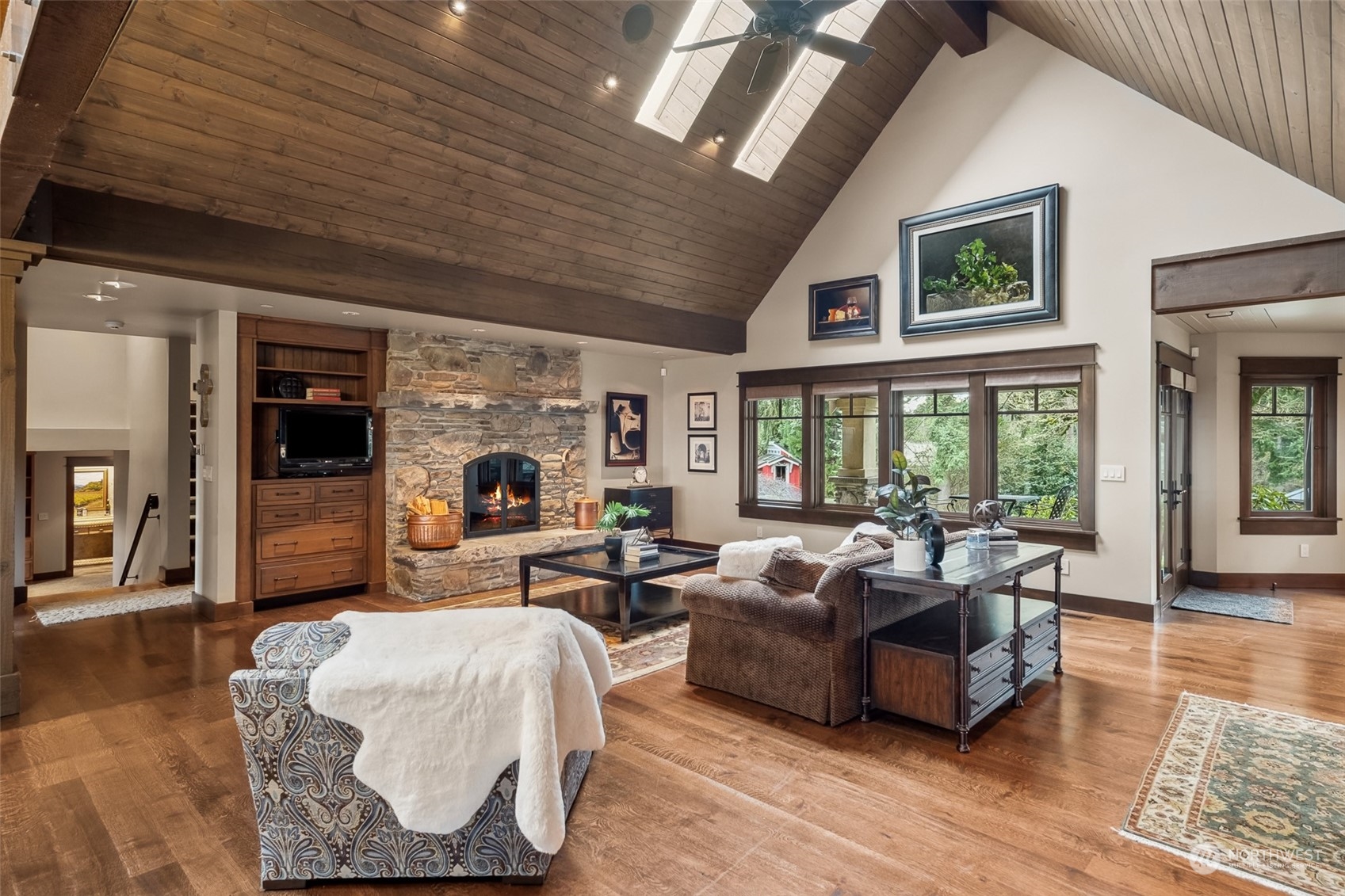 12408 County Line Road East Edgewood, WA 98372 - Photo 5 of 40 a living room with furniture large window and a fireplace