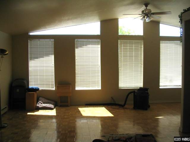 5914 Grass Valley Road Reno, NV 89510 - Photo 5 of 7 a bedroom with furniture and a window