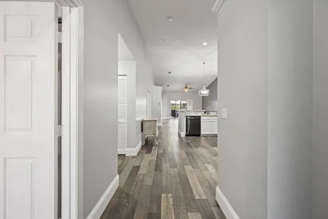 a view of a kitchen from the hallway