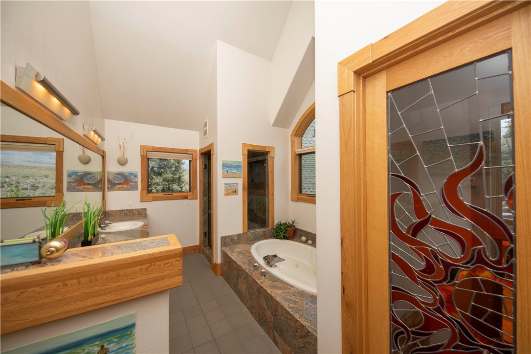 Tbd Tbd Johnson Road Silverthorne, CO 80498 - Photo 14 of 35 Beautiful stained glass doorway in master bathroom