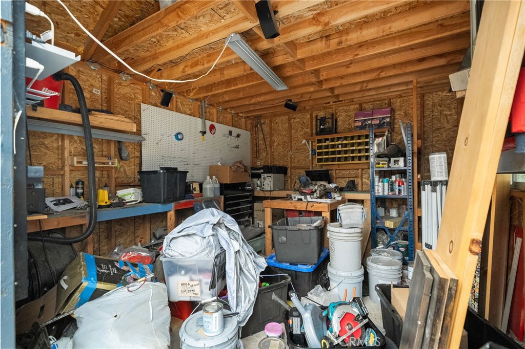 8538 Trey Avenue Riverside, CA 92503 - Photo 21 of 25 a storage room with washer and dryer