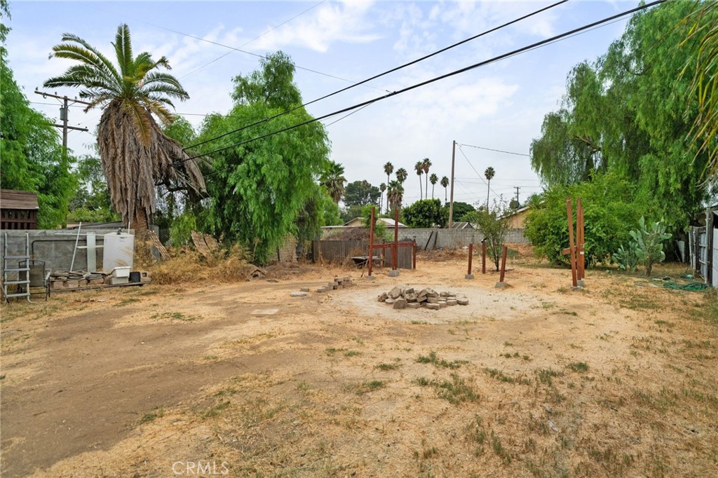8538 Trey Avenue Riverside, CA 92503 - Photo 22 of 25 a view of a backyard with a tree
