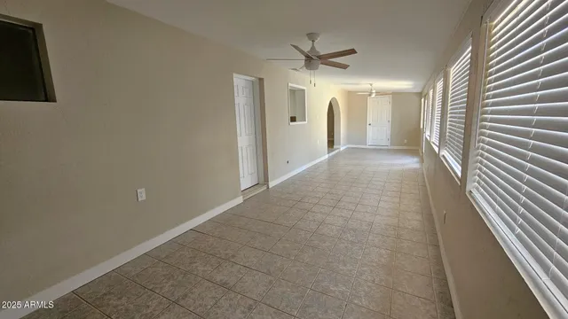 a view of a hallway with a chandelier