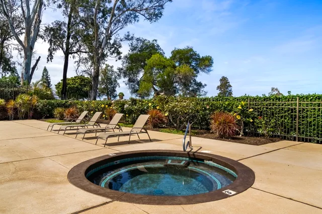 a view of swimming pool from a yard