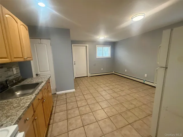 a view of kitchen and utility room