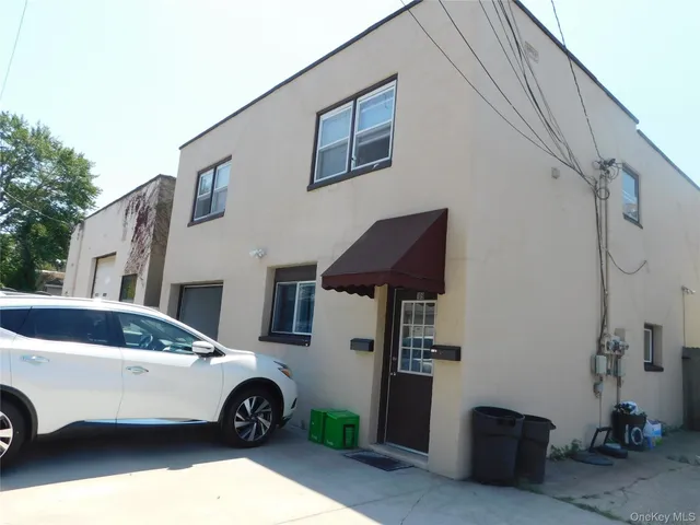 a car parked in front of a house