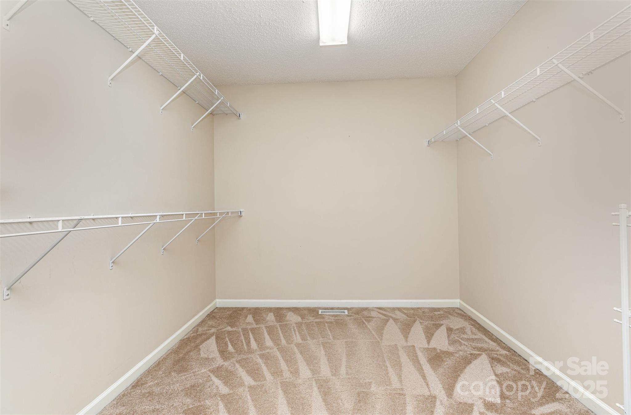 4751 Kemp Dellinger Road Maiden, NC 28650 - Photo 13 of 17 a view of a room with racks on the wall