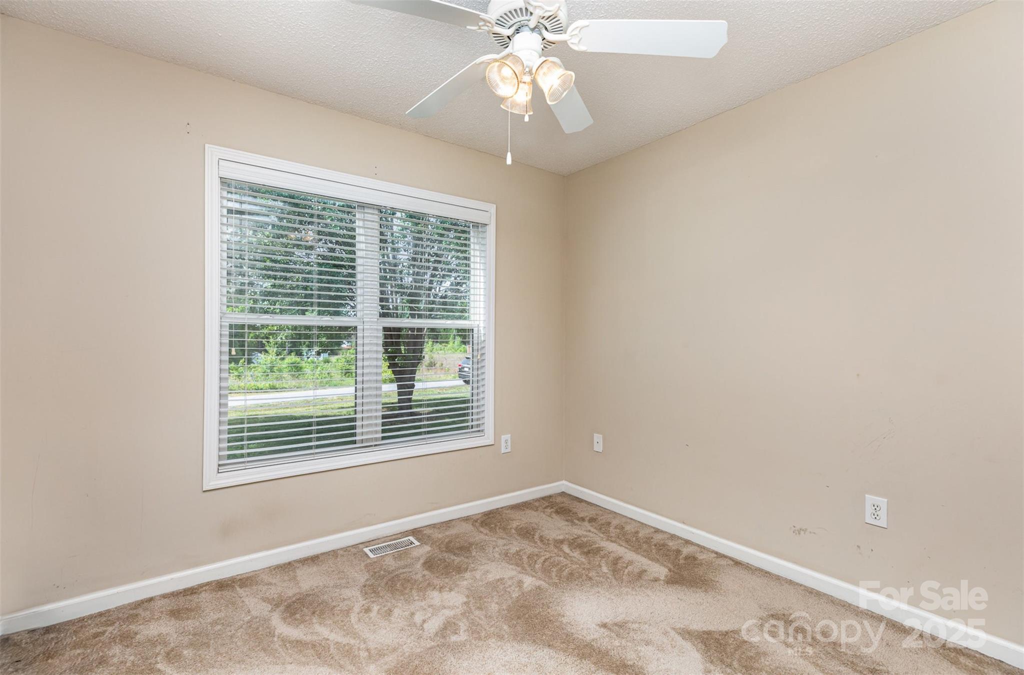 4751 Kemp Dellinger Road Maiden, NC 28650 - Photo 14 of 17 a view of an empty room with a window