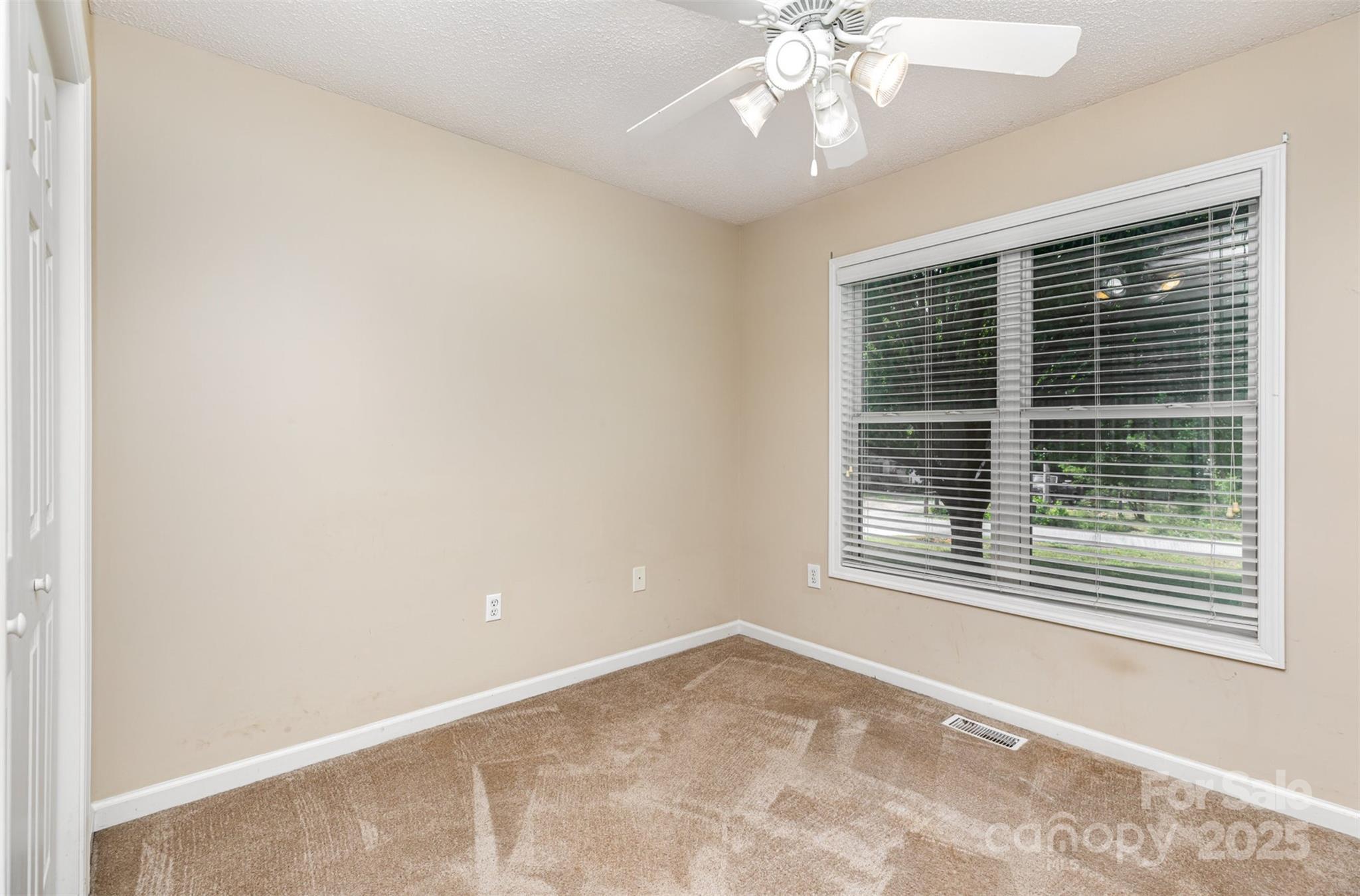 4751 Kemp Dellinger Road Maiden, NC 28650 - Photo 15 of 17 a view of an empty room with a window