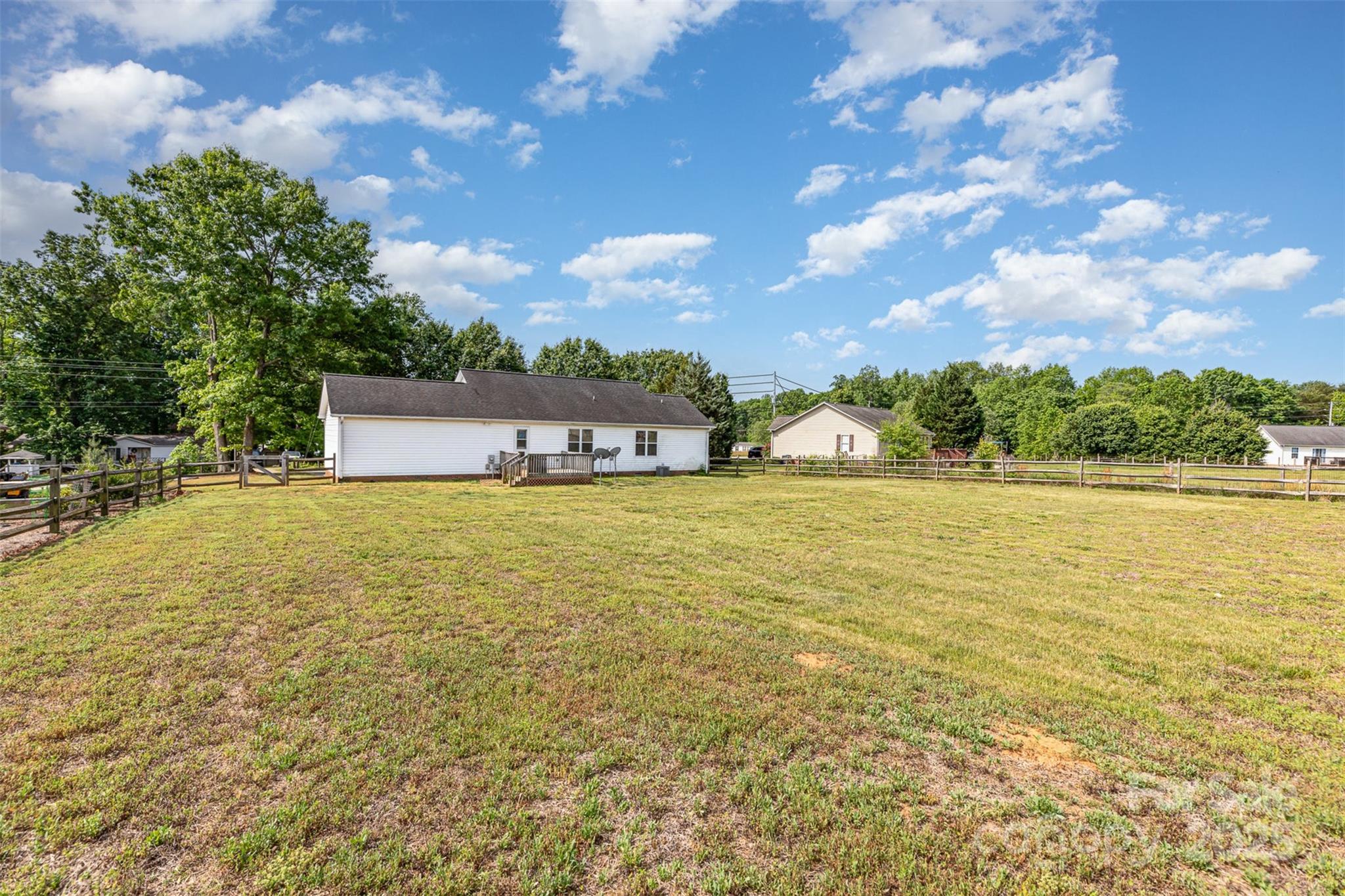 4751 Kemp Dellinger Road Maiden, NC 28650 - Photo 17 of 17 a view of a lake with a yard
