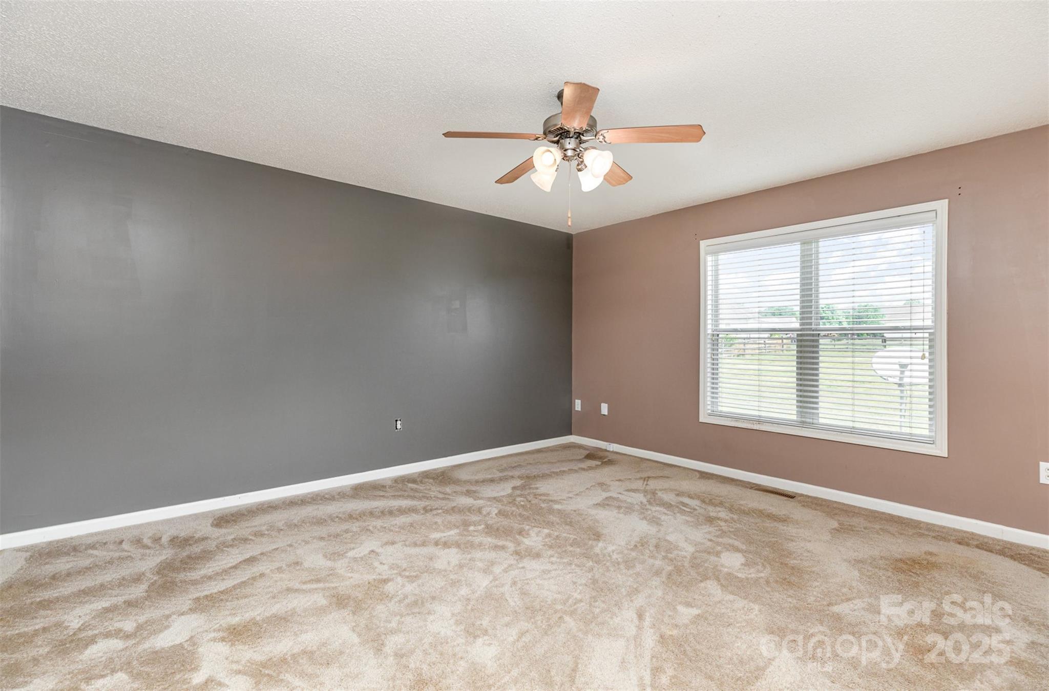 4751 Kemp Dellinger Road Maiden, NC 28650 - Photo 5 of 17 a view of an empty room with a window