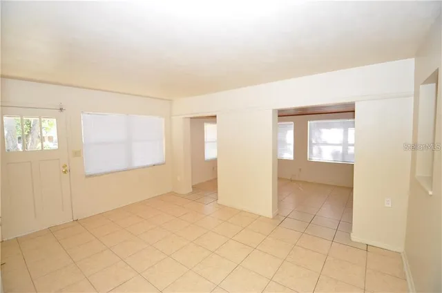 a view of an empty room with window