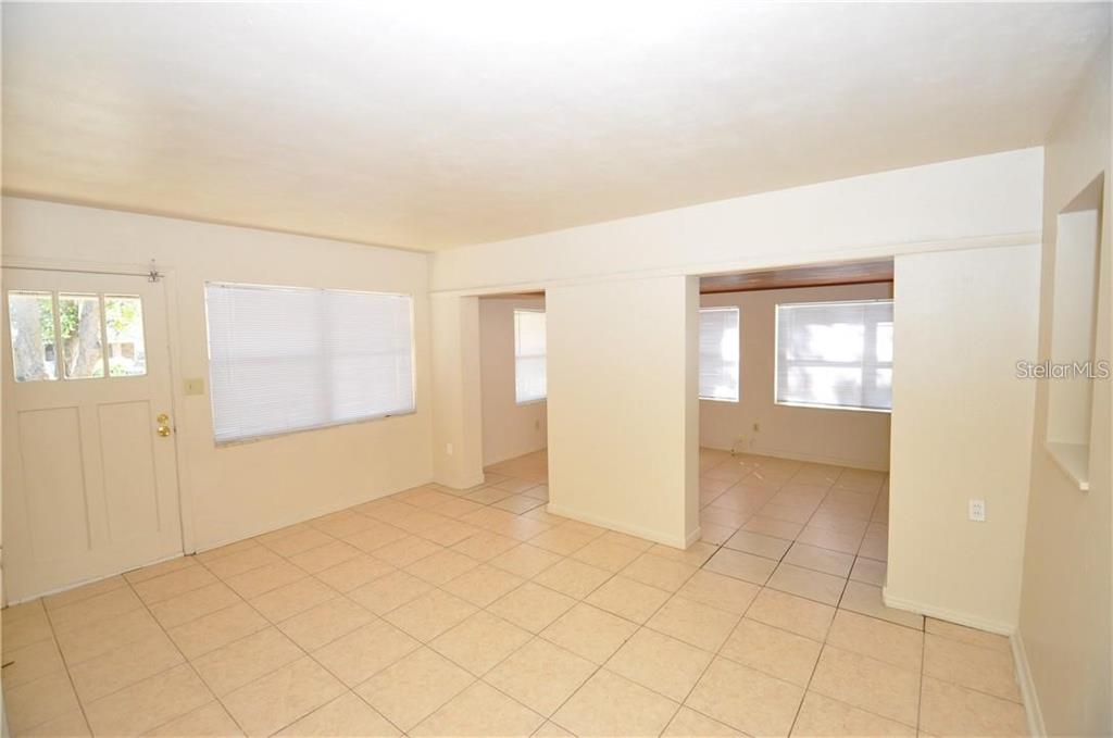 509 Norfolk Circle Lakeland, FL 33801 - Photo 4 of 14 a view of an empty room with window