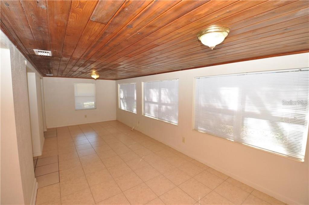 509 Norfolk Circle Lakeland, FL 33801 - Photo 5 of 14 a view of an empty room with a window