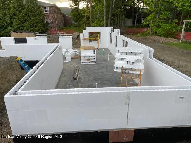 a view of a back yard with patio