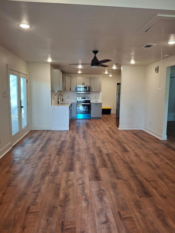 900 Chestnut Street Commerce, TX 75428 - Photo 19 of 19 a view of a kitchen with a sink and a window