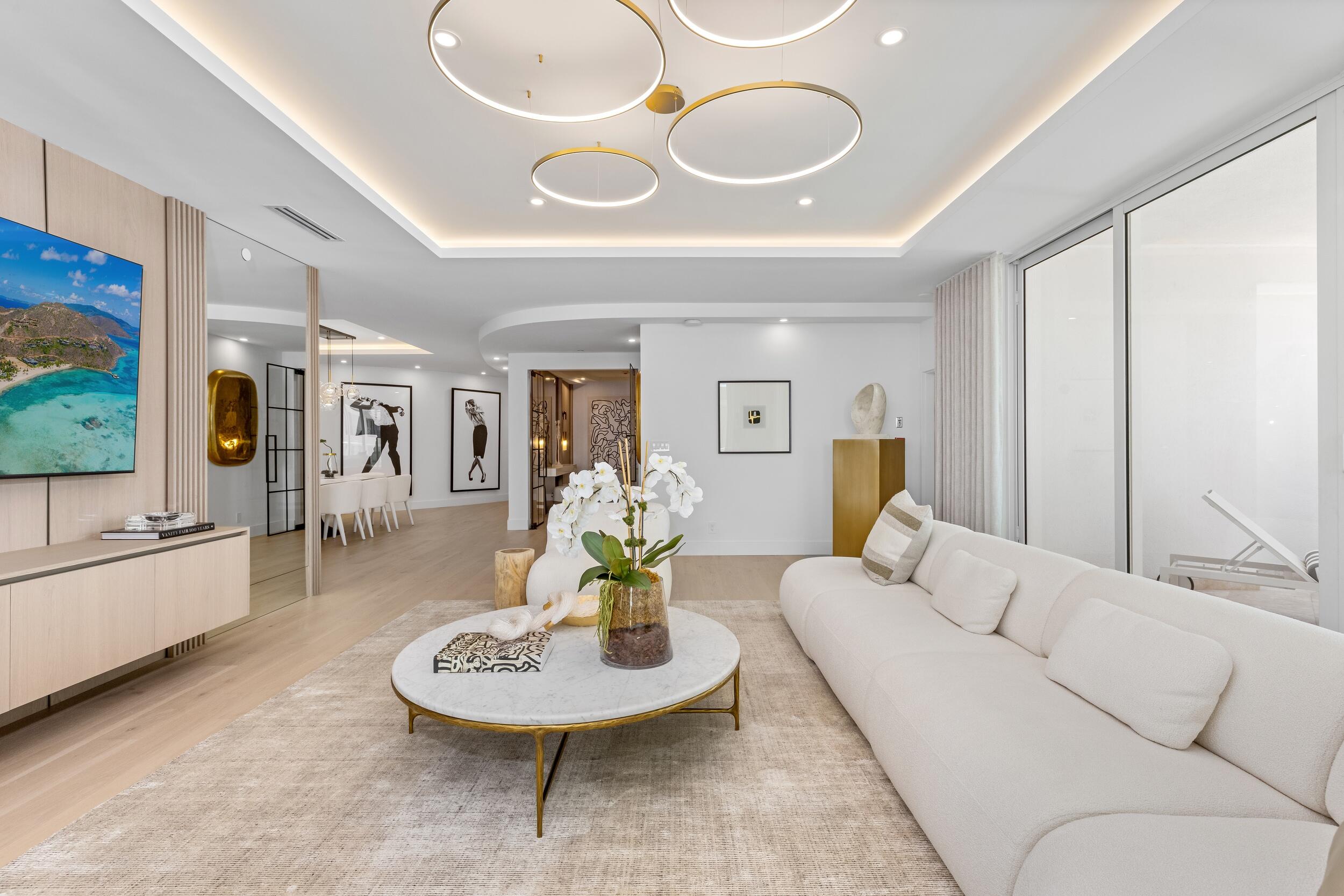 2494 South Ocean Boulevard, Unit C5 Boca Raton, FL 33432 - Photo 12 of 52 a living room with furniture and a large window